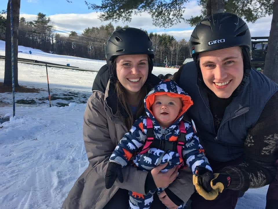 three people posing for a photo